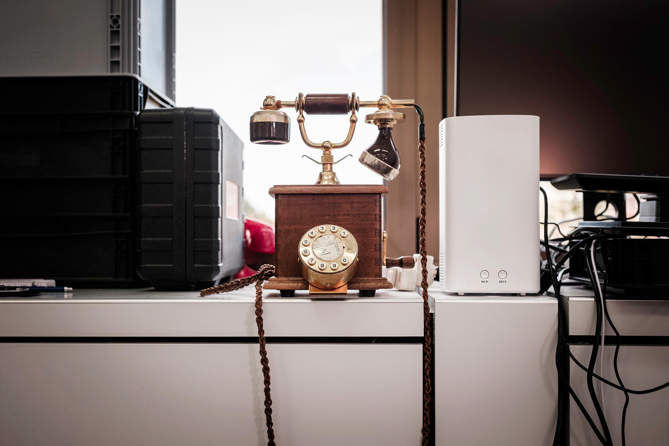 Vintage brass telephone on the office desk